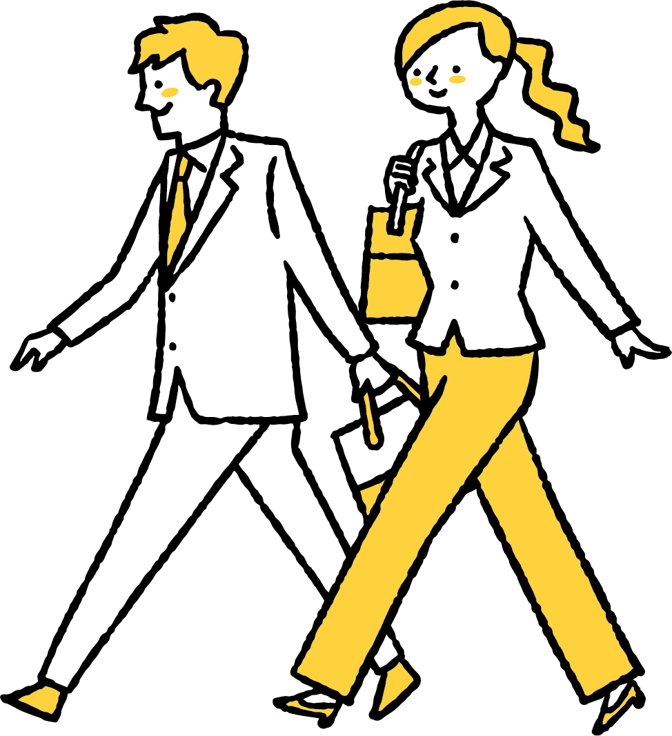 歩くビジネスマン男女