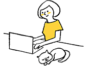 PCを使う女性と猫